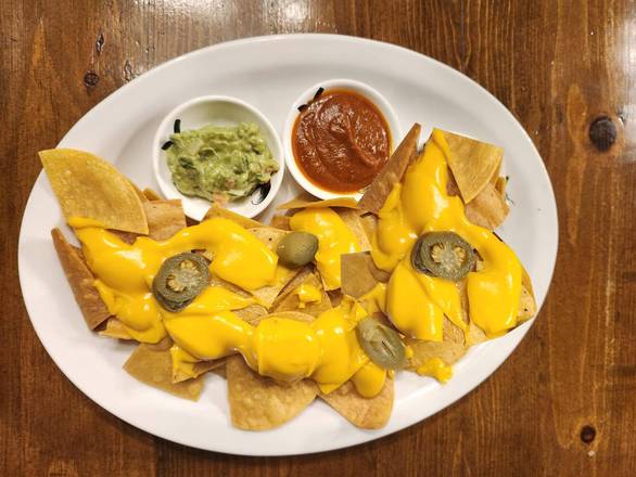 Nachos , cheese and Salsas..
