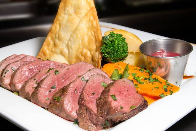 Magret de canard sauce aux framboises & porto