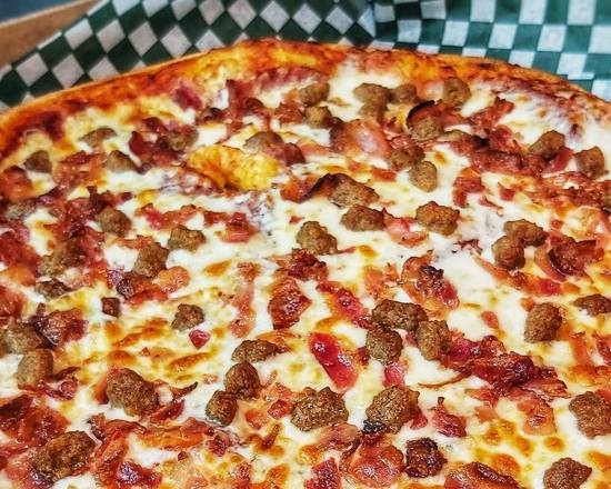 Grande pizza amateur de viandes