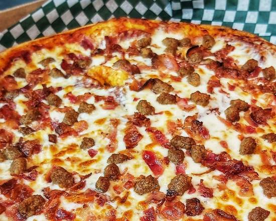 Extra grande pizza amateur de viandes
